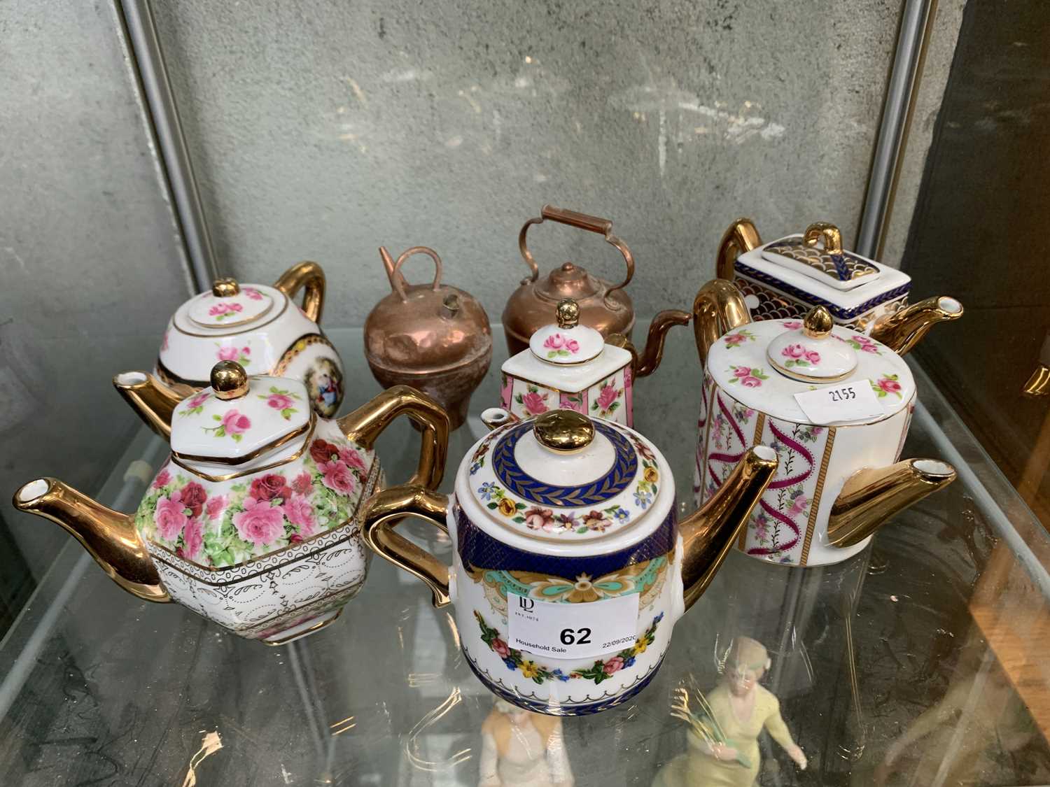 Lot 62 Miniature porcelain teapots etc