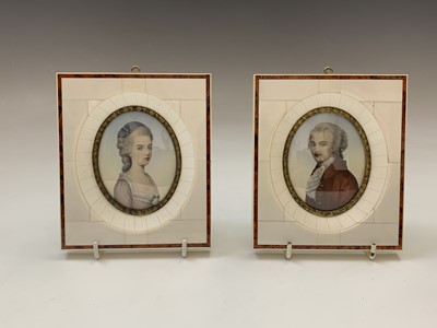 Lot 623 - A pair of portrait miniatures, one signed N....