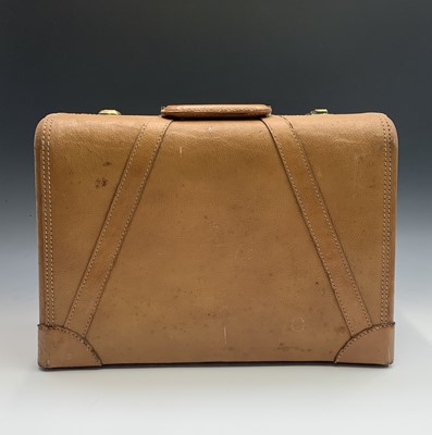 Lot 2809 - A 1950s Platt Luggage leather suitcase. Height...