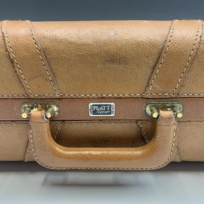 Lot 2809 - A 1950s Platt Luggage leather suitcase. Height...