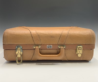 Lot 2809 - A 1950s Platt Luggage leather suitcase. Height...