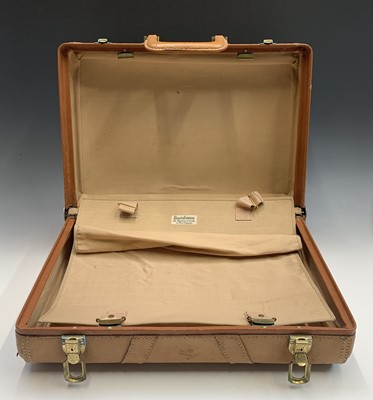 Lot 2809 - A 1950s Platt Luggage leather suitcase. Height...