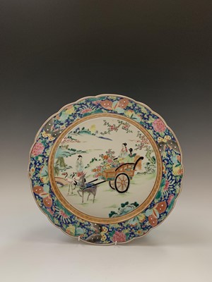 Lot 87 - A Chinese Canton famille rose charger, late...