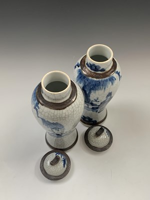 Lot 131 - A pair of Chinese blue and white crackle...