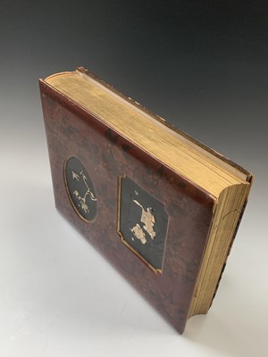 Lot 122 - A Japanese red lacquer photo album, late 19th...