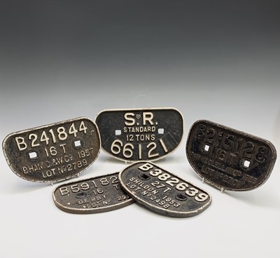 Lot 158 - A group of five cast iron railway wagon plates,...