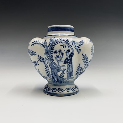 Lot 943 - A 19th century Dutch Delft small vase, of...