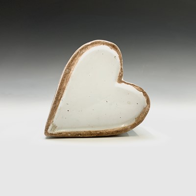 Lot 981 - A Delft heart shaped inkwell and pen holder...