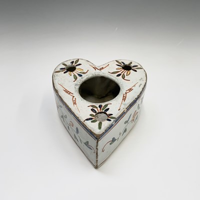 Lot 981 - A Delft heart shaped inkwell and pen holder...