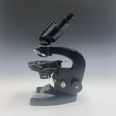 Lot 633 - A Russian OMO AY 12 microscope, with black...