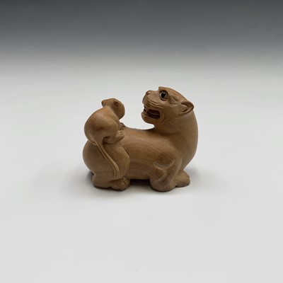 Lot 277 - A Japanese carved wood netsuke, signed, width...