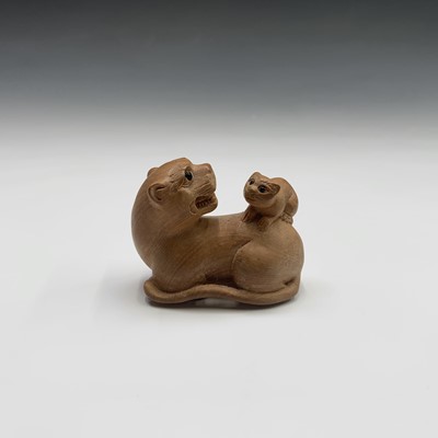 Lot 277 - A Japanese carved wood netsuke, signed, width...