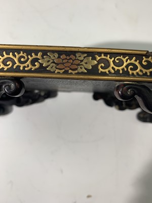 Lot 273 - A Chinese wood and gilt metal inlaid stand,...
