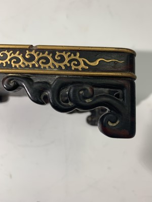 Lot 273 - A Chinese wood and gilt metal inlaid stand,...
