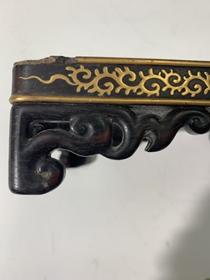 Lot 273 - A Chinese wood and gilt metal inlaid stand,...