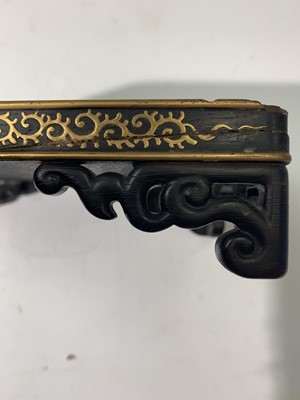 Lot 273 - A Chinese wood and gilt metal inlaid stand,...