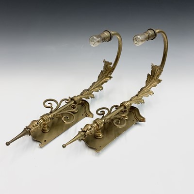 Lot 223 - A pair of ornate brass girandole, early 20th...