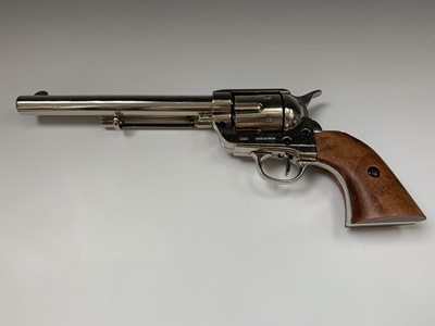 Lot 604 - A Denix replica colt 45. with caps in original...