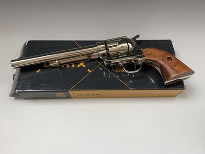 Lot 604 - A Denix replica colt 45. with caps in original...