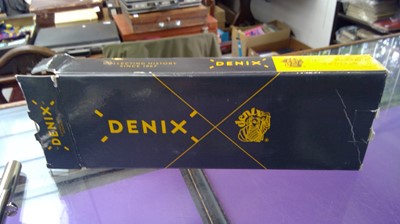 Lot 604 - A Denix replica colt 45. with caps in original...