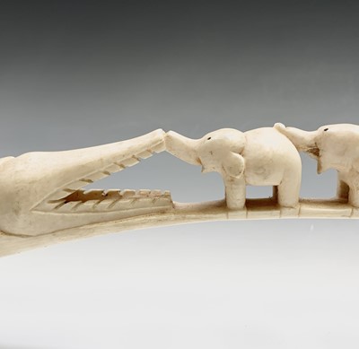 Lot 290 - A carved ivory tusk, early 20th century, with...