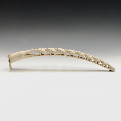 Lot 290 - A carved ivory tusk, early 20th century, with...