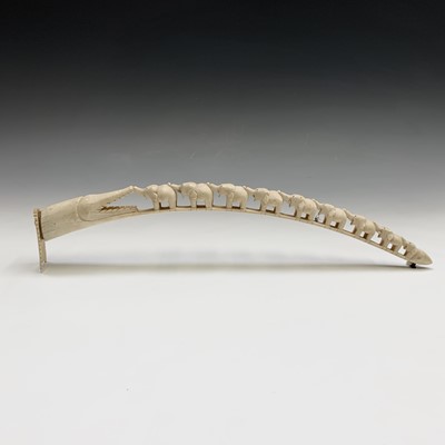 Lot 290 - A carved ivory tusk, early 20th century, with...