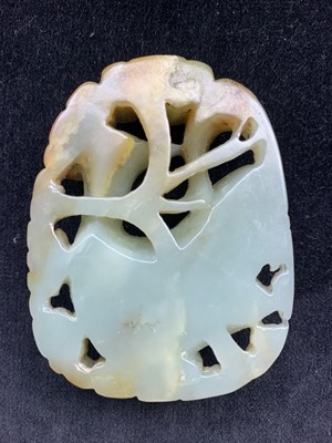 Lot 19 - A large Chinese carved & reticulated celadon...