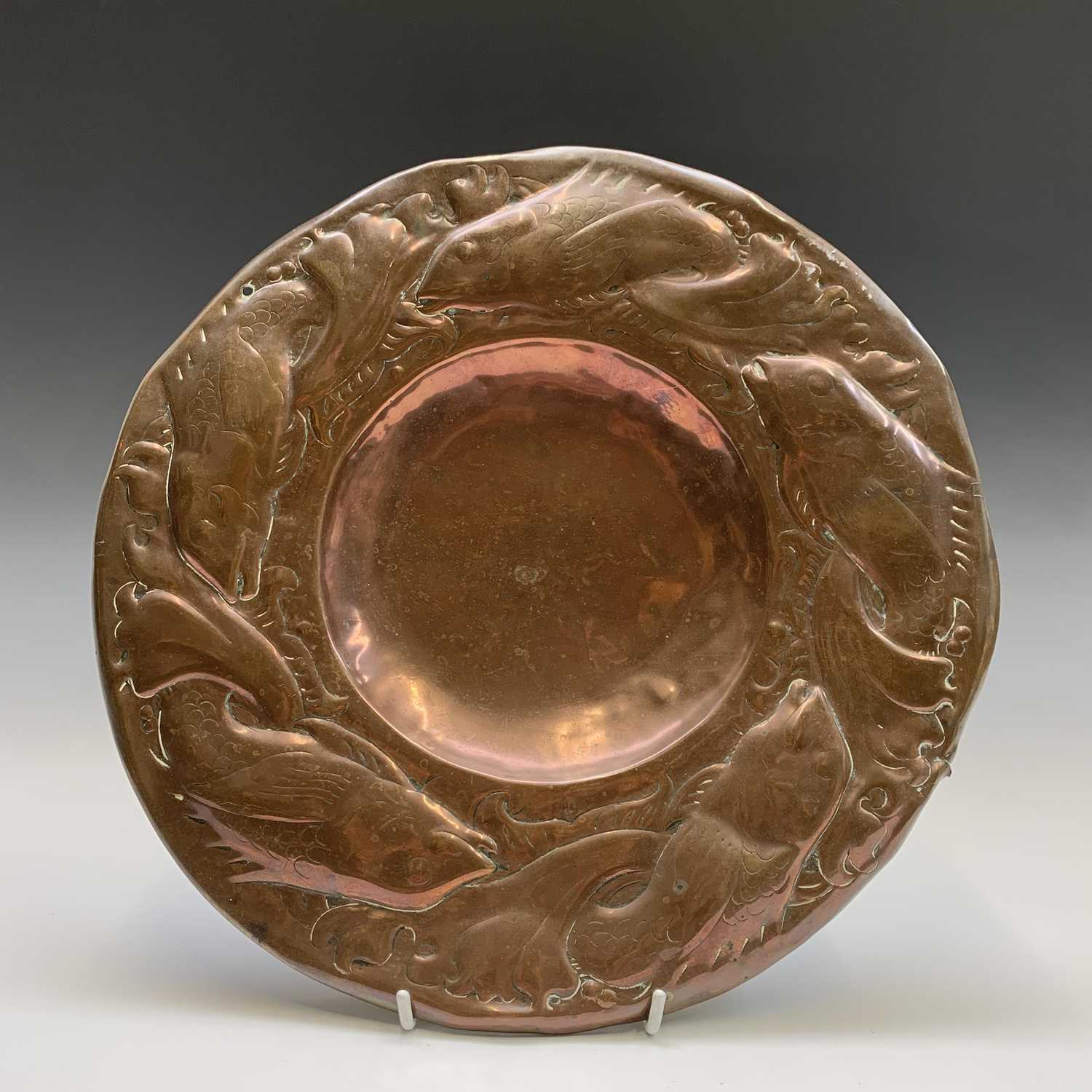 Lot 178 - A Newlyn copper charger, the border repousse...