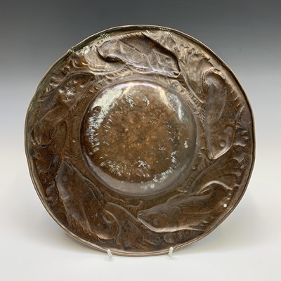 Lot 178 - A Newlyn copper charger, the border repousse...