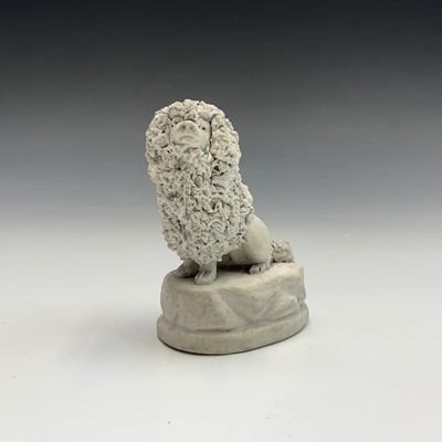 Lot 970 - A biscuit porcelain poodle, circa 1820,...