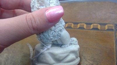 Lot 970 - A biscuit porcelain poodle, circa 1820,...
