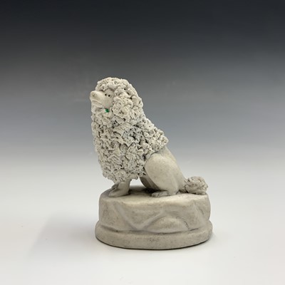 Lot 970 - A biscuit porcelain poodle, circa 1820,...