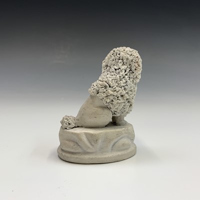 Lot 970 - A biscuit porcelain poodle, circa 1820,...