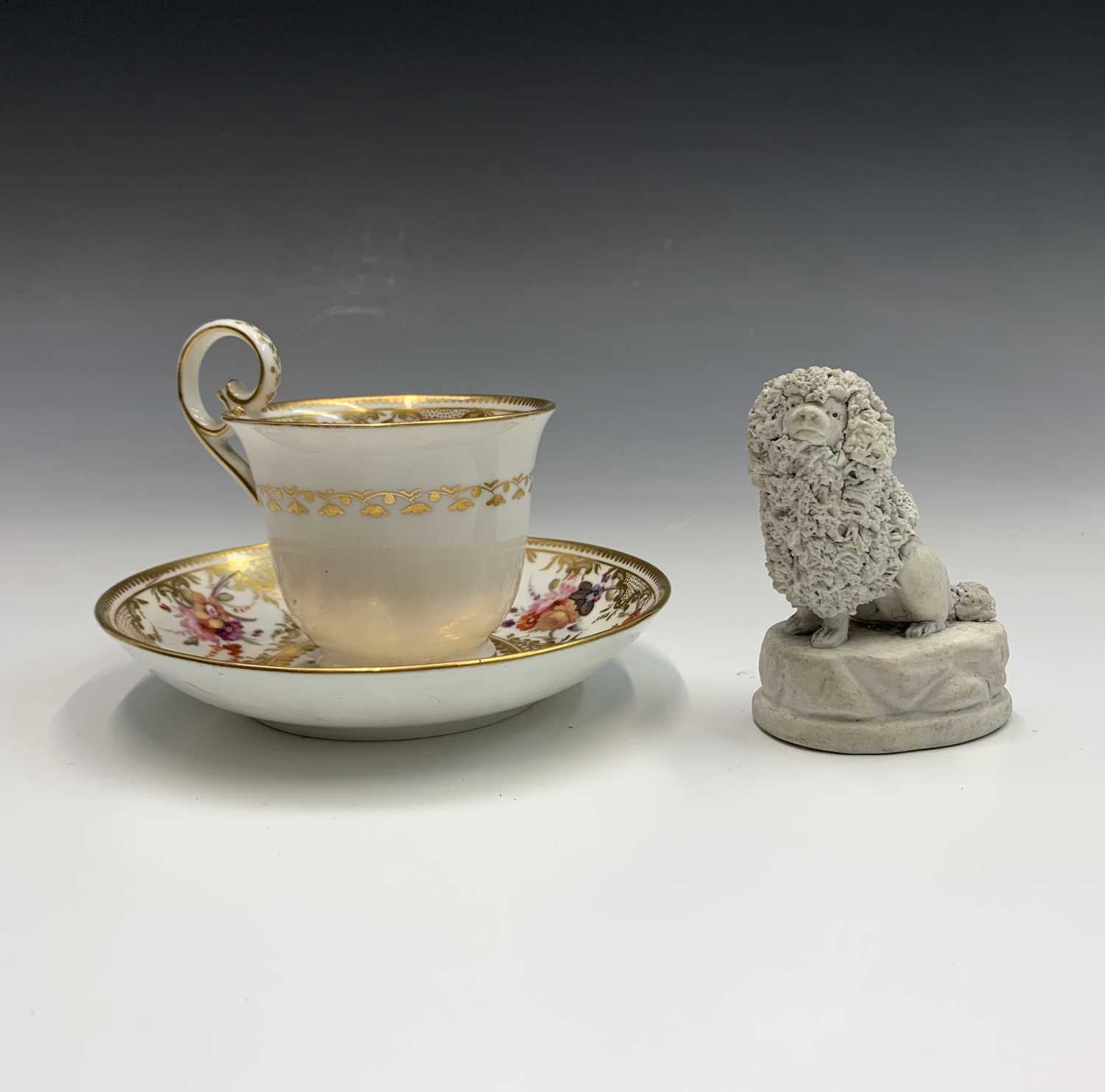 Lot 970 - A biscuit porcelain poodle, circa 1820,...