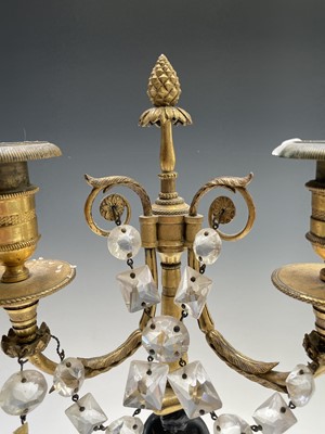 Lot 60 - A pair of French bronze and gilt bronze...