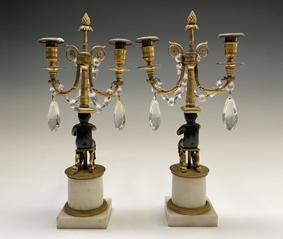 Lot 8 - A pair of French bronze and gilt bronze...