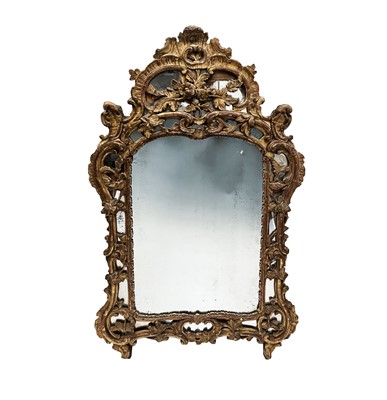 Lot 3086 - A George III giltwood mirror, the frame with...