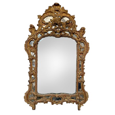 Lot 3059 - A George III giltwood mirror, the frame with...