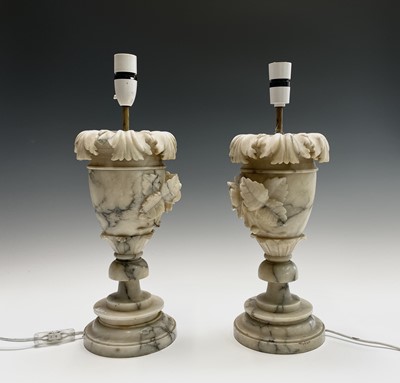 Lot 172 - A pair of carved alabaster table lamps,...