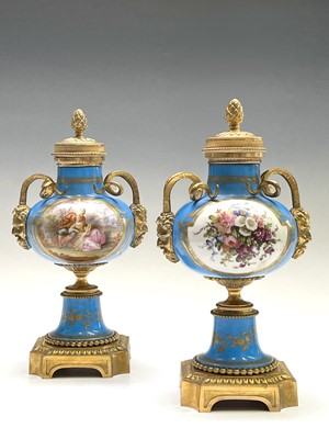 Lot 5 - A pair of French 'Sevres' porcelain ormolu...