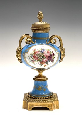 Lot 5 - A pair of French 'Sevres' porcelain ormolu...