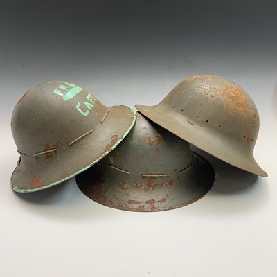 Lot 243 - Three Second World War A.R.P helmets.