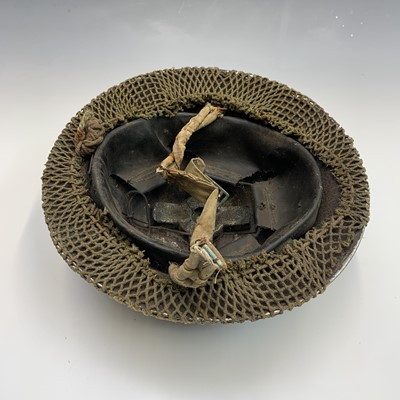 Lot 244 - British Army Second World War helmet.
