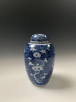 Lot 75 - A Chinese blue and white prunus pattern jar...
