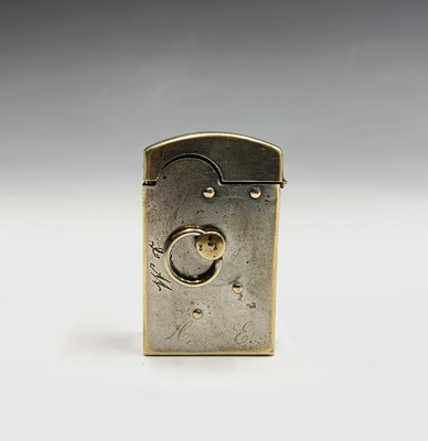 Lot 274 - A 19th century silver plated brass lighter...