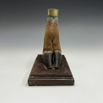 Lot 310 - Taxidermy - A brass mounted deer foot,...