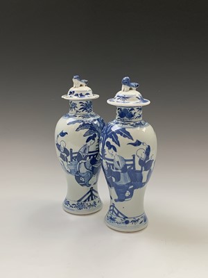 Lot 137 - A near pair of Chinese blue and white baluster...