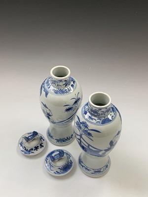Lot 137 - A near pair of Chinese blue and white baluster...