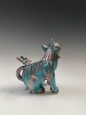 Lot 57 - A Japanese earthenware shishi or temple dog,...